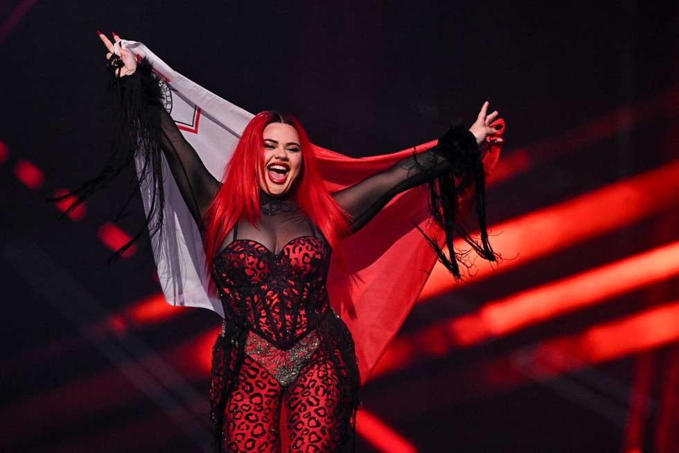 Maltese singer Miriana Conte representing Malta with the song "Serving" parades with her national flag during the dress rehearsal for the final of the Eurovision Song Contest 2025 at the St. Jakobshalle arena in Basel